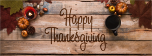happy thanksgiving flat lay wood table fall colors header
