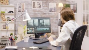 Video editing by women at desk