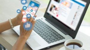 social media customers love woman at computer facebook